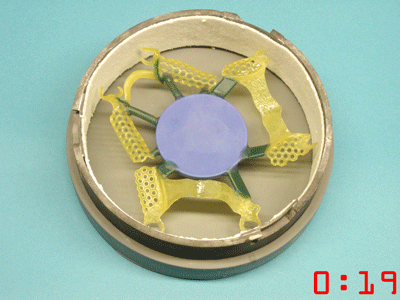 Three Ti-Light patterns mounted to a waxdisk for the Cast system of Ti-Research.