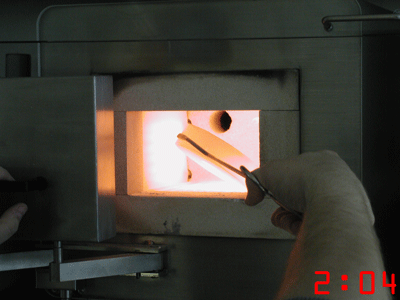 Burned out mold for Cast by Ti-Research is taken out of the kiln for casting